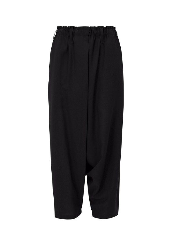 The SEAMLESS BOTTOMS by 132 5. ISSEY MIYAKE are black, loose-fit pants with an elastic waistband and draped, tapered legs, made from recycled polyester and shown on a white background. view 3 of 12