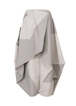 The NO.17 PRINT skirt by 132 5. ISSEY MIYAKE features a high-waisted design with abstract, angular draping in light gray and white, creating a sculptural, voluminous silhouette.