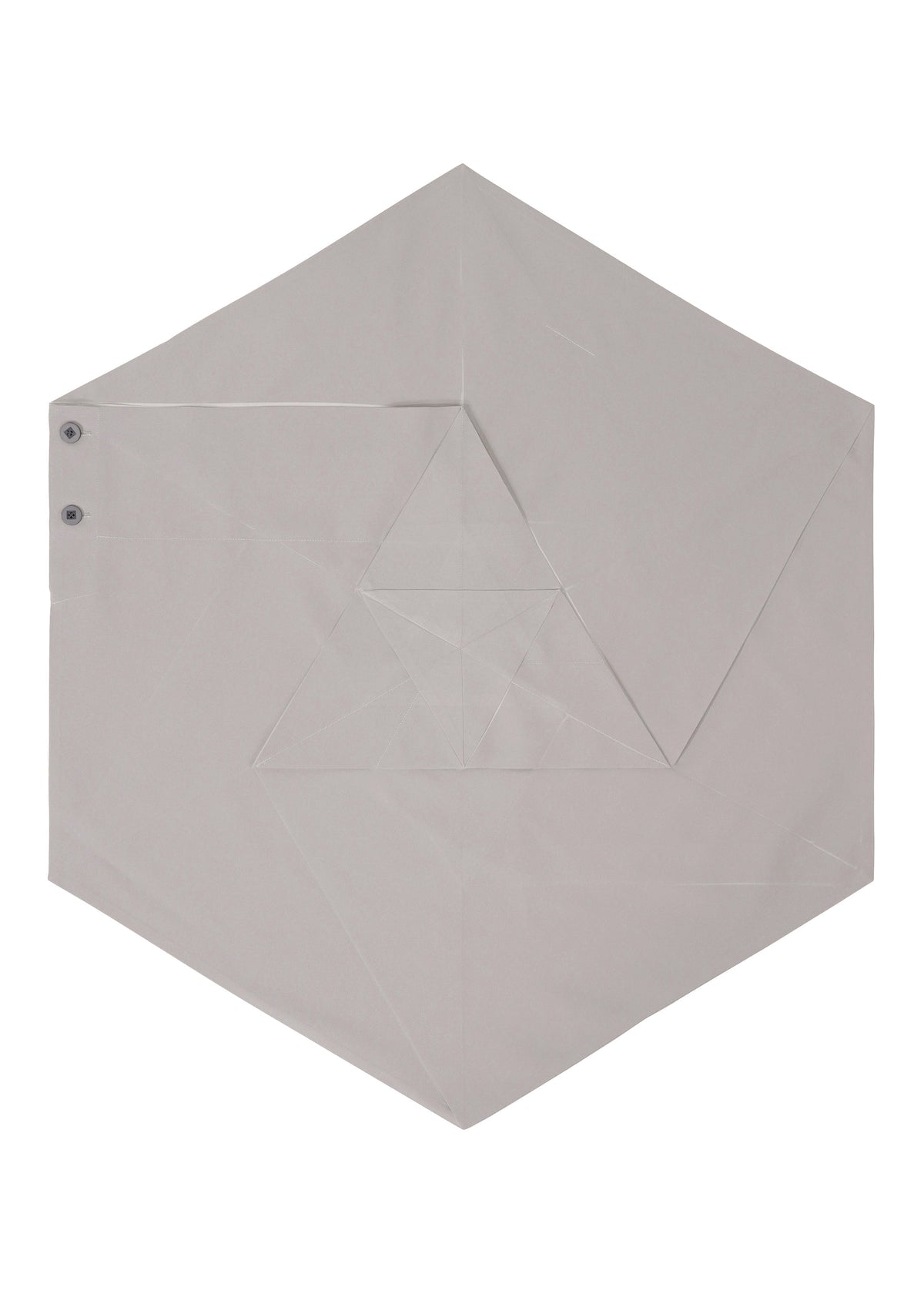 The NO.17 PRINT skirt by 132 5. ISSEY MIYAKE features a gray, hexagonal fabric folded with precise geometric lines, accented by side snaps and an origami-inspired layered design that highlights its innovative structure. view 6 of 11