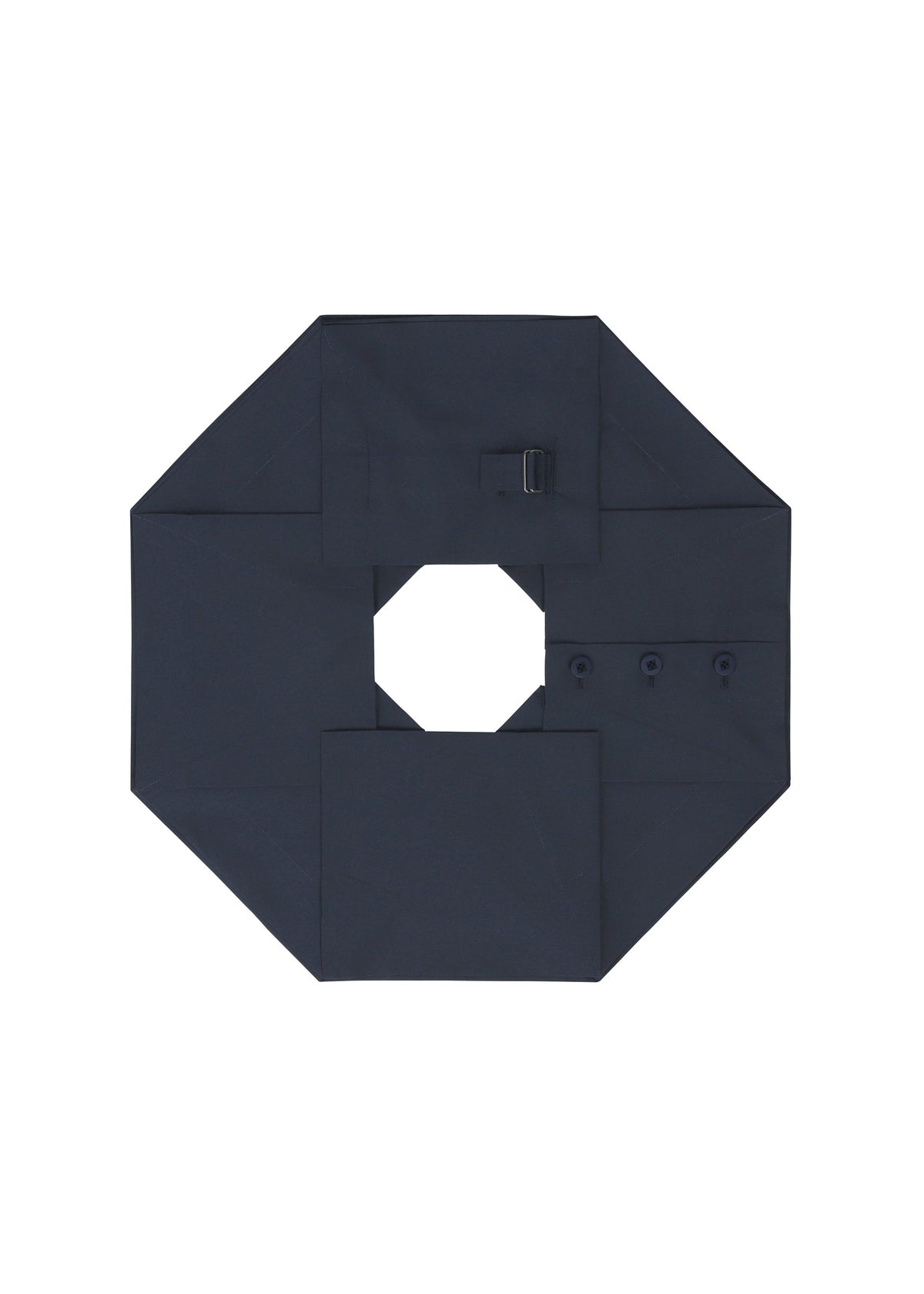 A dark navy blue NO.6 SOLID by 132 5. ISSEY MIYAKE is arranged octagonally with a hollow center, small buckle, three buttons, and visible seams on white, emphasizing its unique three-dimensional structure. view 6 of 11
