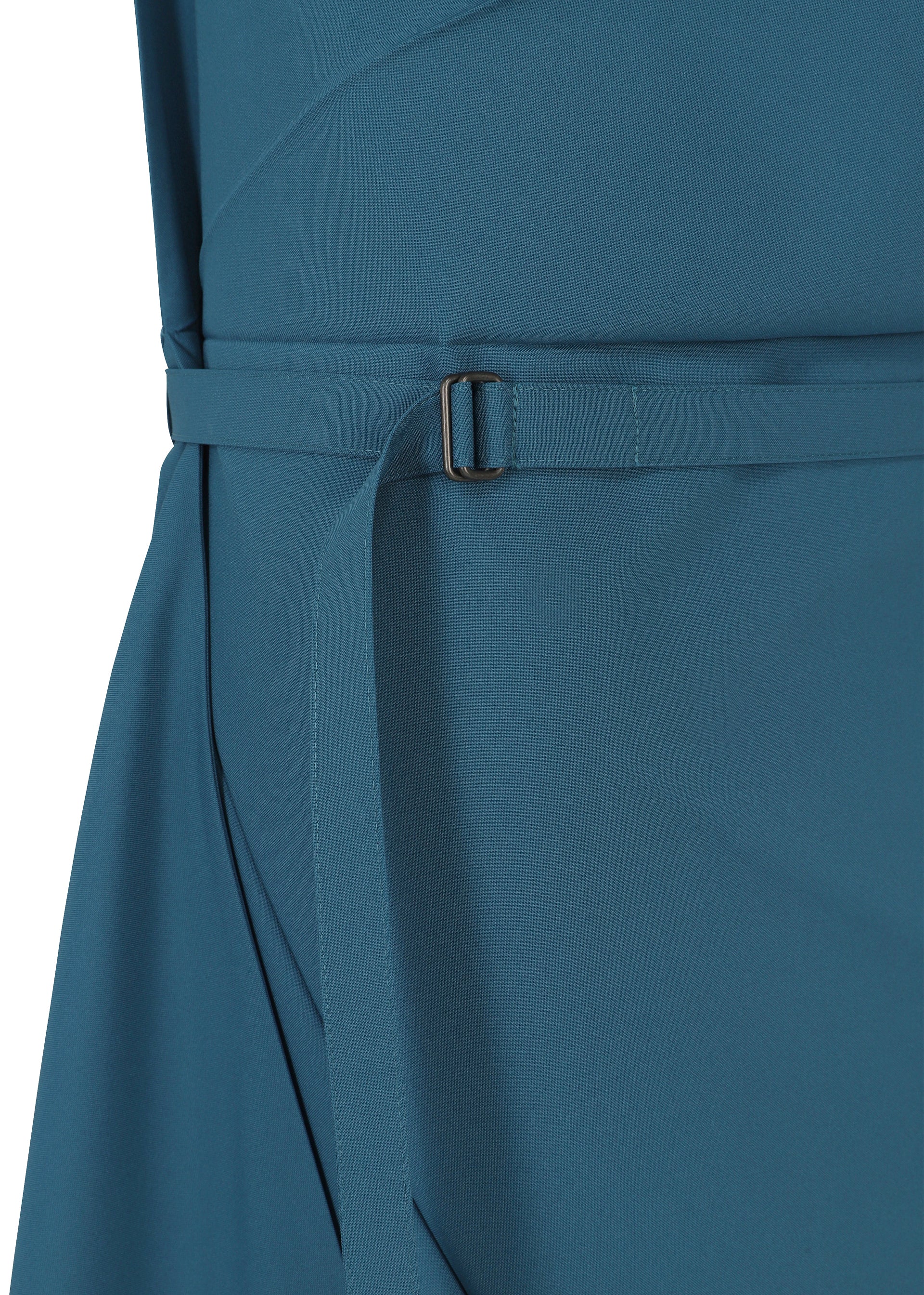 Zoomed view A close-up of the FACET SOLID by 132 5. ISSEY MIYAKE, shown in teal blue. The plant-derived polyester garment features a fabric belt with a rectangular metal buckle, cinched at the waist, and displays smooth texture with subtle seams and pleats.
