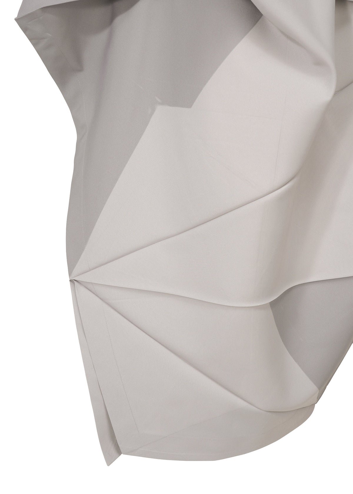 Close-up of NO.17 PRINT by 132 5. ISSEY MIYAKE—a light gray, smooth, slightly reflective fabric with sharp creases and angular folds that create a geometric, origami-inspired look echoing the No. 17 folding structure. view 4 of 11