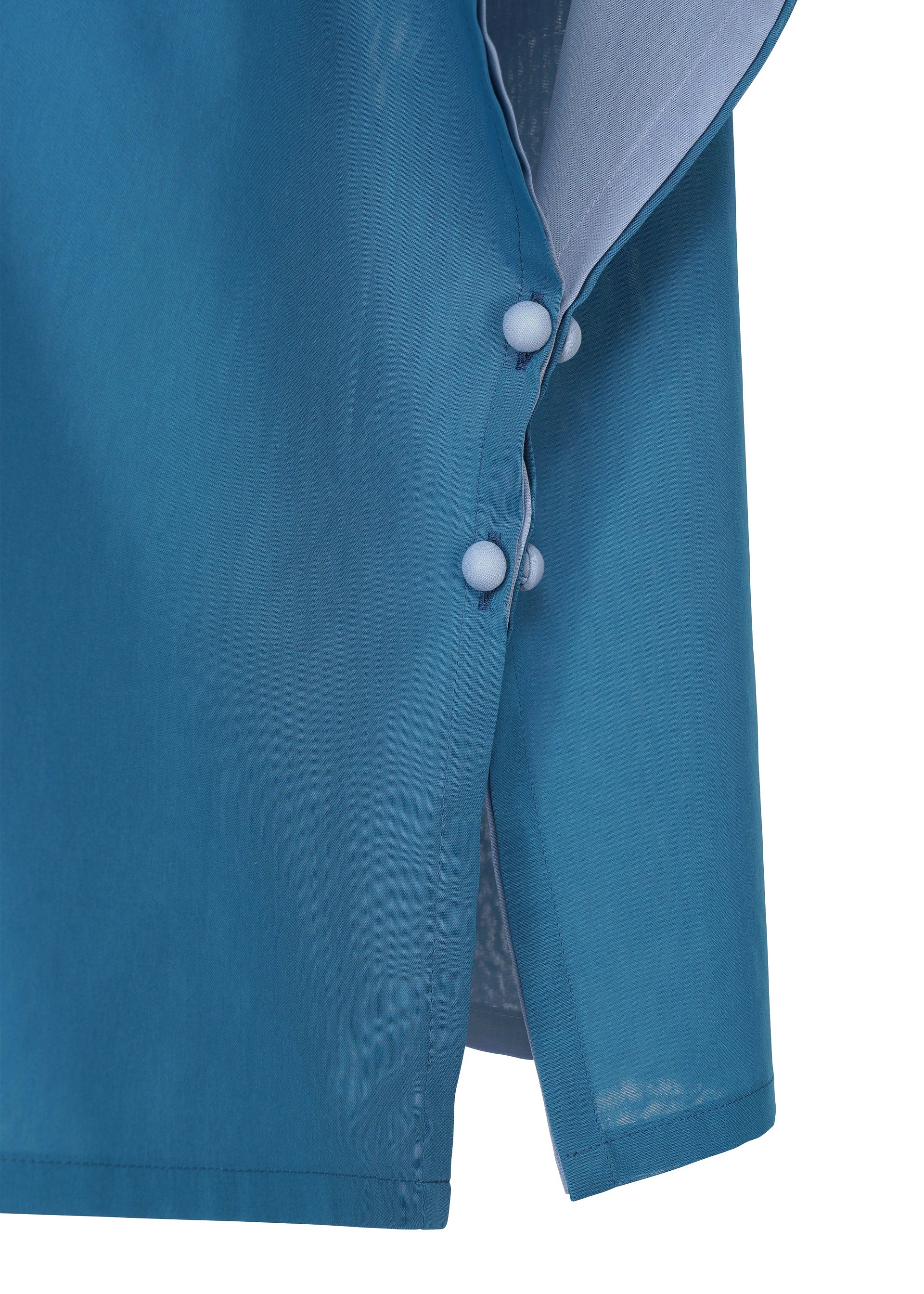 Zoomed view Close-up of SHEER FOLIO by 132 5. ISSEY MIYAKE: a blue sleeve with three fabric-covered buttons along the seam, partially unbuttoned to show layered fabric and a lighter blue inner lining.