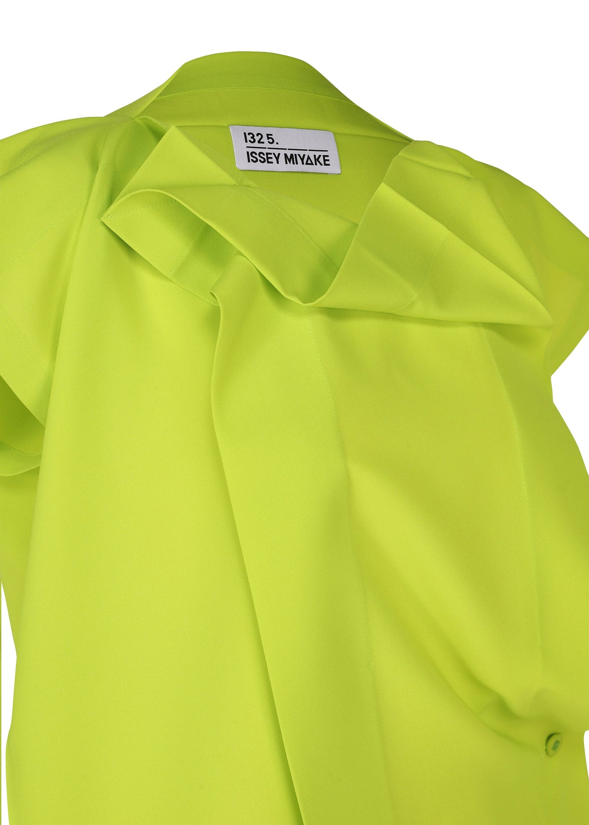 A close-up of a bright yellow-green FLAT TUCK T by 132 5. ISSEY MIYAKE, featuring structured folds and a visible brand label inside the collar, making a gorgeous impression. view 5 of 12