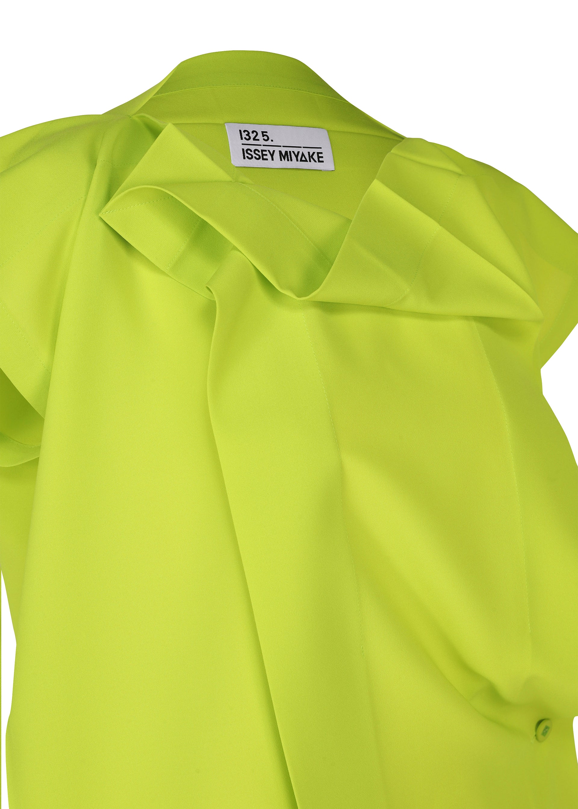 Zoomed view A close-up of a bright yellow-green FLAT TUCK T by 132 5. ISSEY MIYAKE, featuring structured folds and a visible brand label inside the collar, making a gorgeous impression.