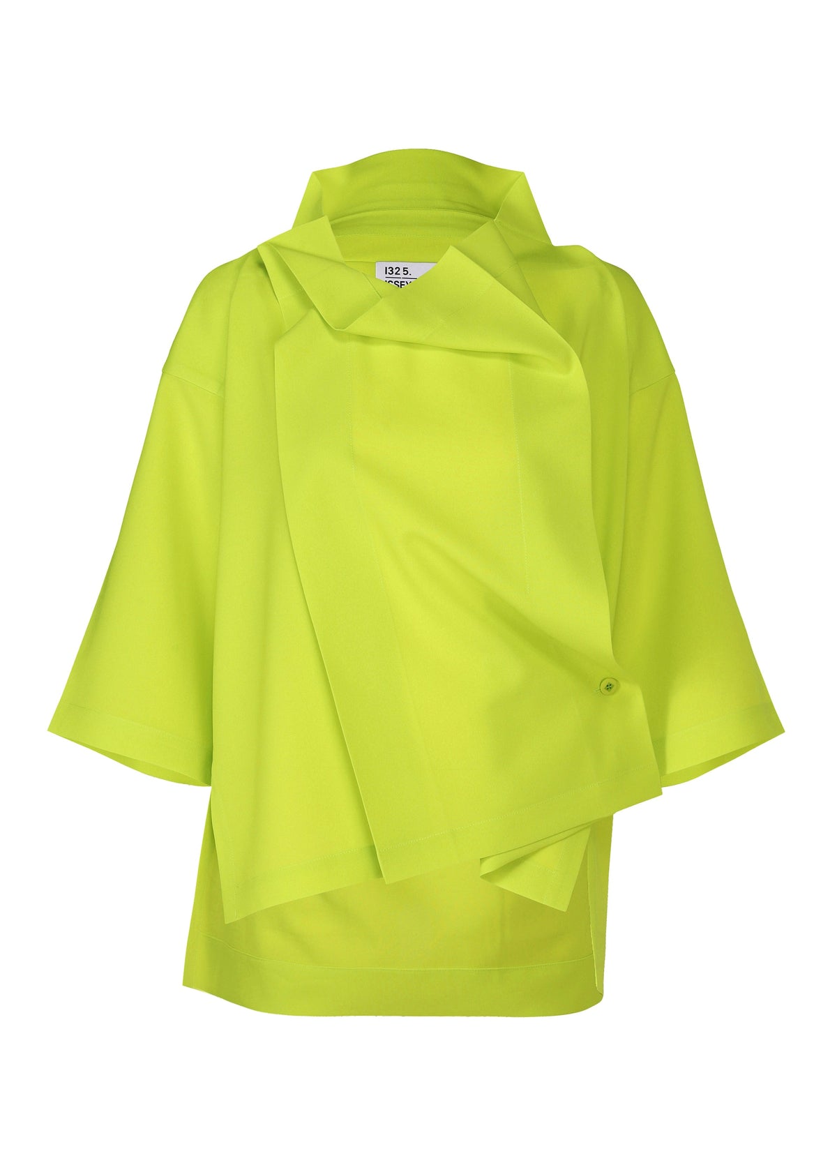 The FLAT TUCK T by 132 5. ISSEY MIYAKE, a neon yellow oversized jacket with wide sleeves and an asymmetrical front flap, is styled over a draping top and shown against a white background. view 3 of 13