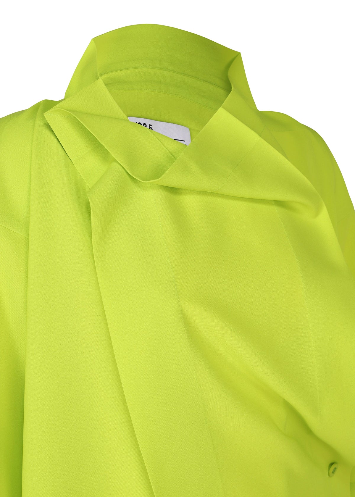 A close-up of the FLAT TUCK T by 132 5. ISSEY MIYAKE, a neon yellow-green collared top with a modern, structured design and smooth fabric. A partially visible white label is sewn inside the collar. view 5 of 13