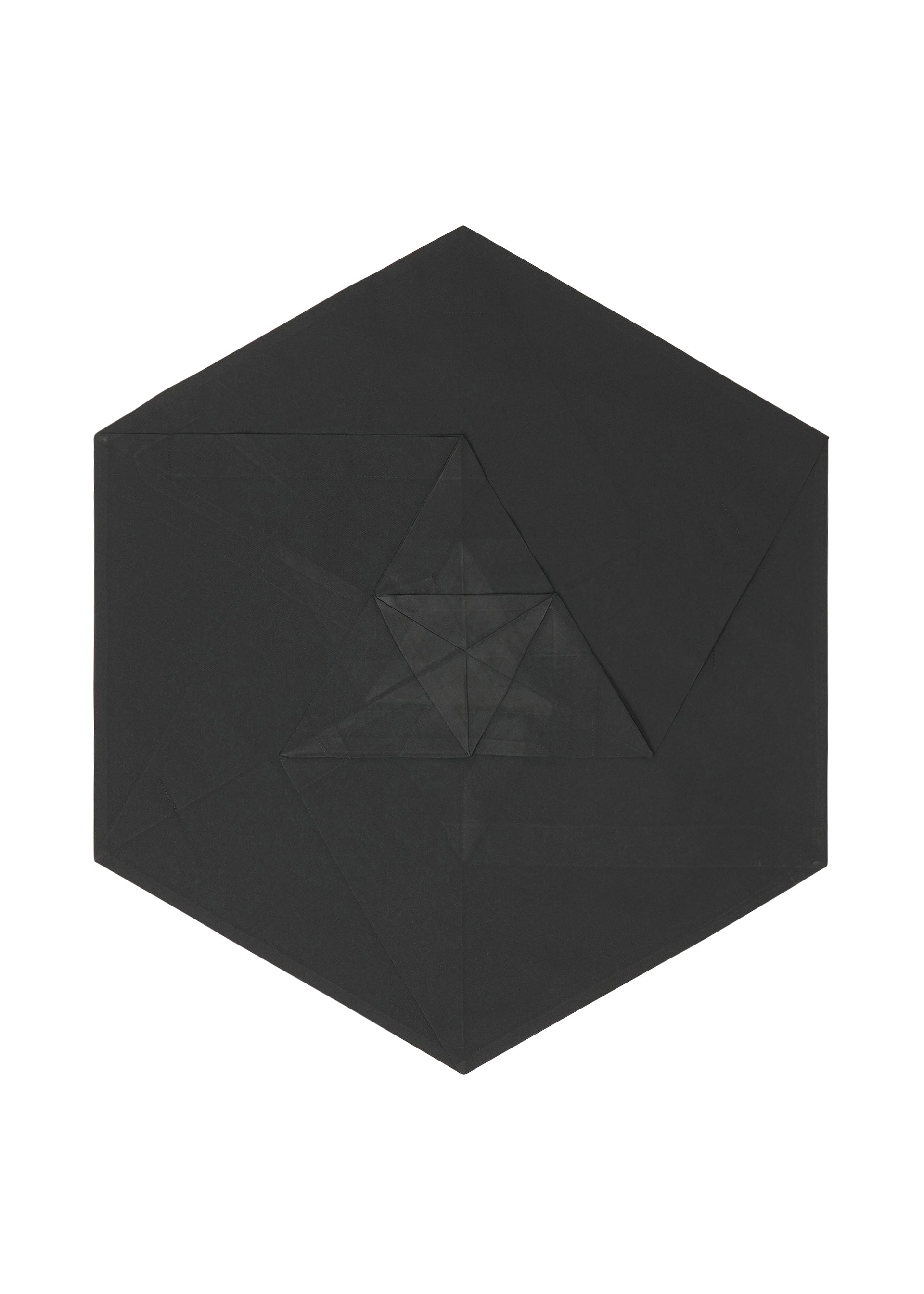 Zoomed view NO.17 PRINT by 132 5. ISSEY MIYAKE features flat black origami paper folded into a hexagon, with crisp crease lines creating geometric patterns—an inspiring element for wearable design.