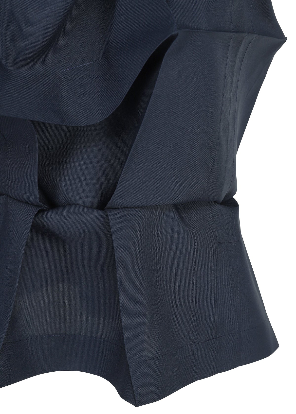Close-up of the NO.6 SOLID by 132 5. ISSEY MIYAKE in navy, showcasing its crisp three-dimensional form with layered folds, clean seams, and precise tailored details. view 3 of 9