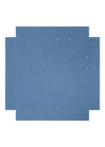 A flat, unfolded FOLD RAMIE PRINT box by 132 5. ISSEY MIYAKE in blue with a unique design rests on a white background, showing pre-scored fold lines, side flaps, and small round fasteners along two edges.