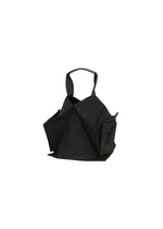 The No.1-BG by 132 5. ISSEY MIYAKE is a black, geometric sculptural folding bag featuring angular folded shapes and a single top handle, shown against a white background. - BLACK×LUSTER （no.18）