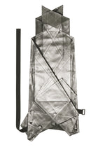The F-BT by 132 5. ISSEY MIYAKE is a geometric, transparent backpack with angular shapes, layered mesh, black straps, and foil accents, shown flat on a white background.