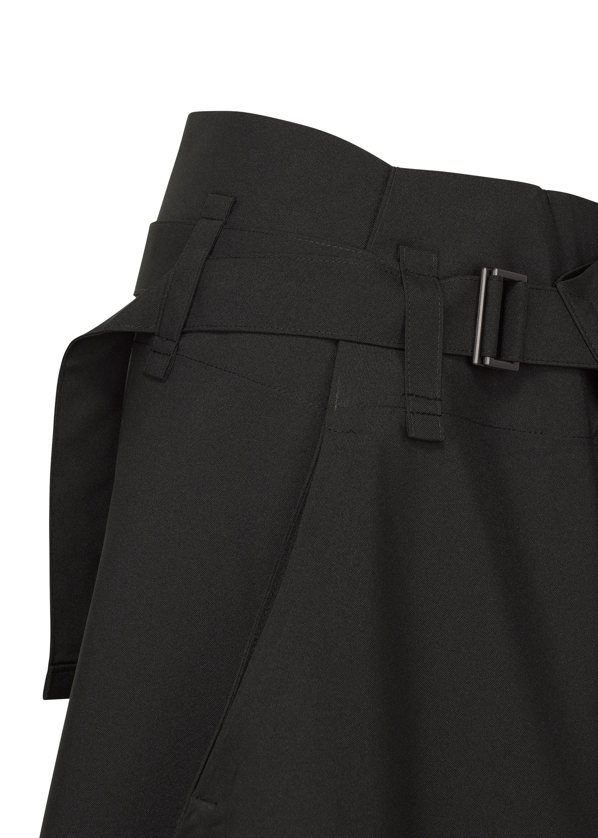 Close-up of F-BT pants by 132 5. ISSEY MIYAKE, displaying a fabric belt with rectangular metal buckle and visible stitching details; likely crafted from recycled polyester in a solid color. view 4 of 9