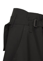 Close-up of F-BT pants by 132 5. ISSEY MIYAKE, displaying a fabric belt with rectangular metal buckle and visible stitching details; likely crafted from recycled polyester in a solid color.