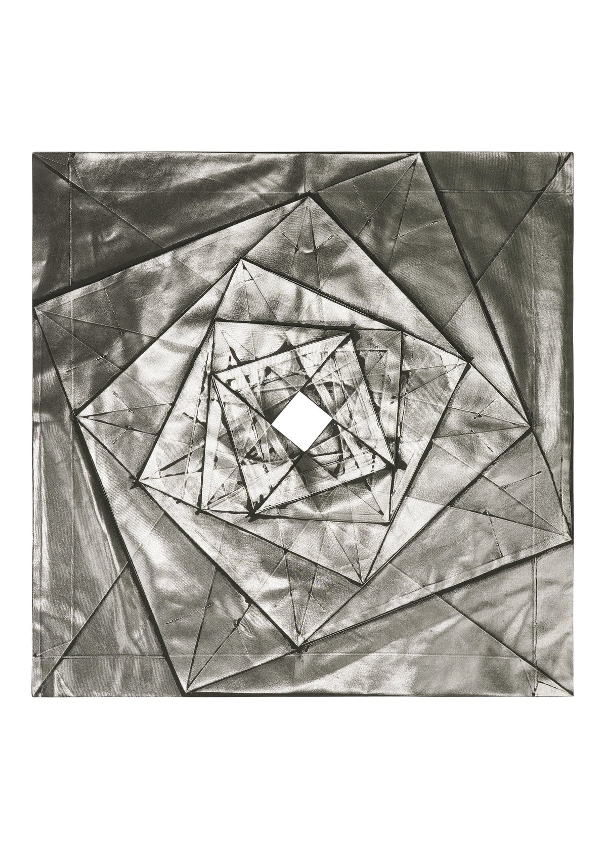 No.1-1 by 132 5. ISSEY MIYAKE showcases abstract geometric art with overlapping metallic triangles and rectangles in a spiral pattern, reflecting foil dress lines and converging to a diamond shape in monochromatic gray tones. view 4 of 9