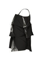 No.1-1 by 132 5. ISSEY MIYAKE: a black sleeveless recycled polyester top with asymmetrical layered ruffles and shiny silver-edged accents in a pyramid silhouette, shown on a plain white background.