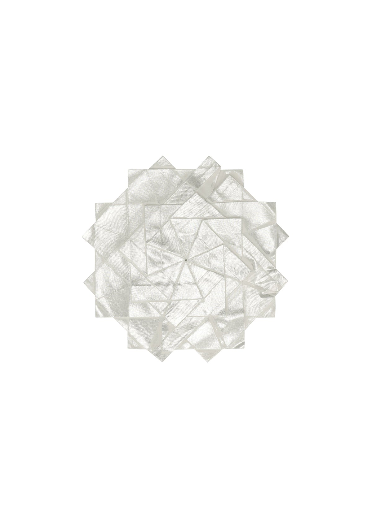No.10-1 by 132 5. ISSEY MIYAKE features overlapping translucent, rectangular white sheets, foldable like a garment, arranged in an oval shape on a plain white background. view 5 of 8