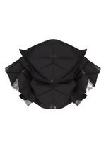 Front-facing view of No.10-2 by 132 5. ISSEY MIYAKE—a black, geometrically folded piece with angular layers reminiscent of origami or an abstract mask—displayed against a white background, its striking design echoing the sleek sophistication of a foil top made from recycled polyester.