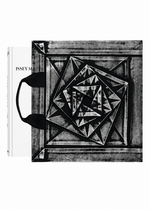 A black-and-white textured tote bag with geometric patterns, inspired by Issey Miyake’s innovative design philosophy, is placed over a white book titled “ISSEY MIYAKE (Limited Collectors Edition)” from ISSEY MIYAKE BOOKS, with the bag’s black handles resting on the left side. - WHITE (no.01)