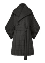 ISSEY MIYAKE PLEATED GRID black quilted jacket featuring a wide shawl collar, belted waist, and pleated wide sleeves in a long, padded coat silhouette. - Black