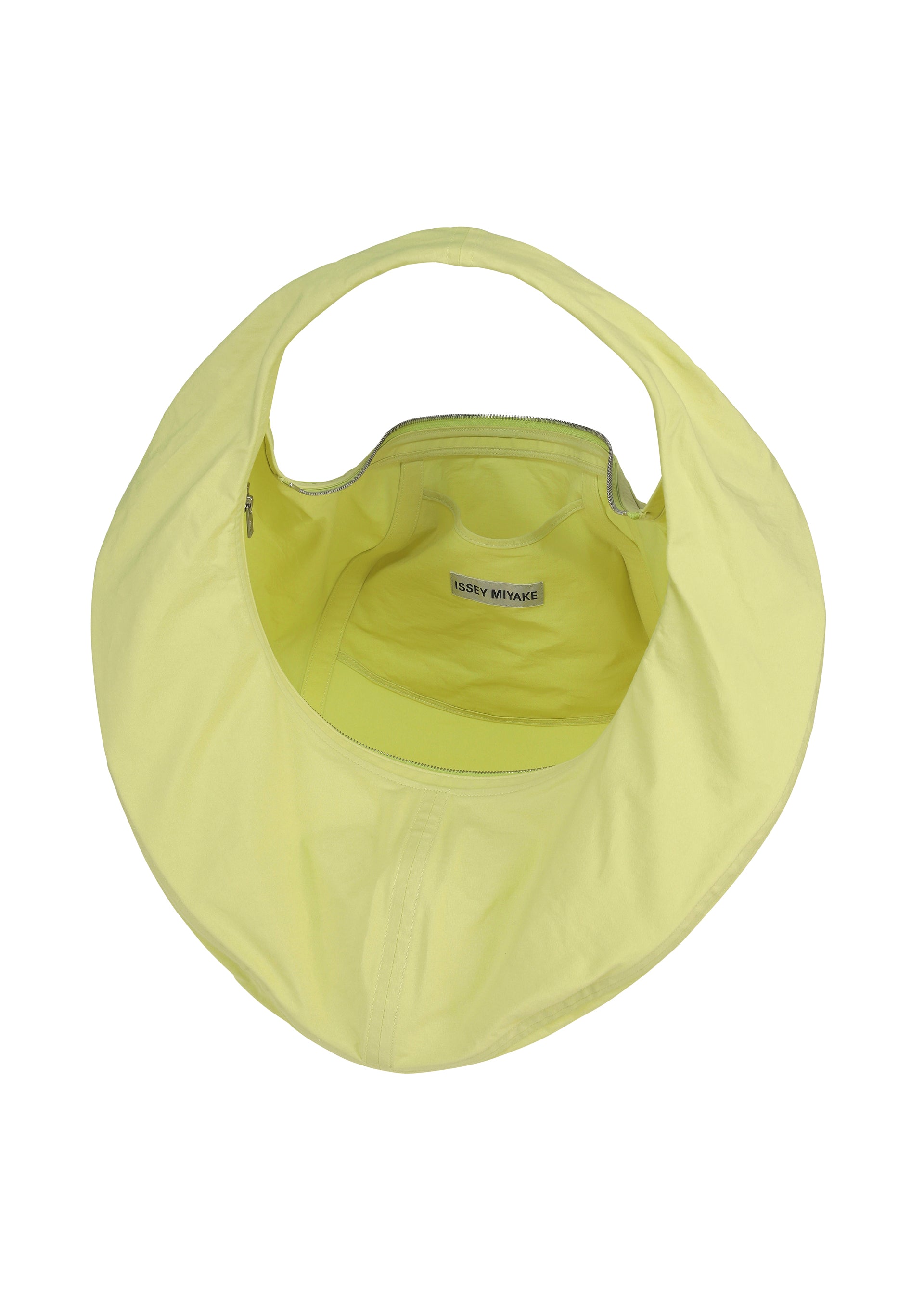 Zoomed view Top view of the ISSEY MIYAKE PAPER BALLOON 2—a light yellow, circular shoulder bag with a single handle, open zippered compartment, subtle crinkled texture like Washi paper, and visible inner label.