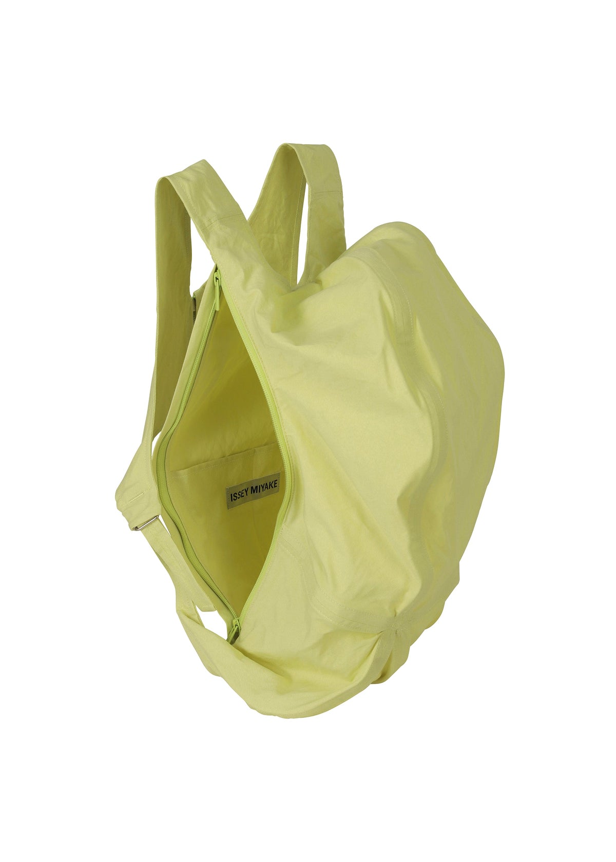 The ISSEY MIYAKE PAPER BALLOON 2 is a light yellow backpack with a curved, crinkled texture inspired by Japanese Washi paper, two wide shoulder straps, and an inner label, displayed against a white background. view 7 of 10