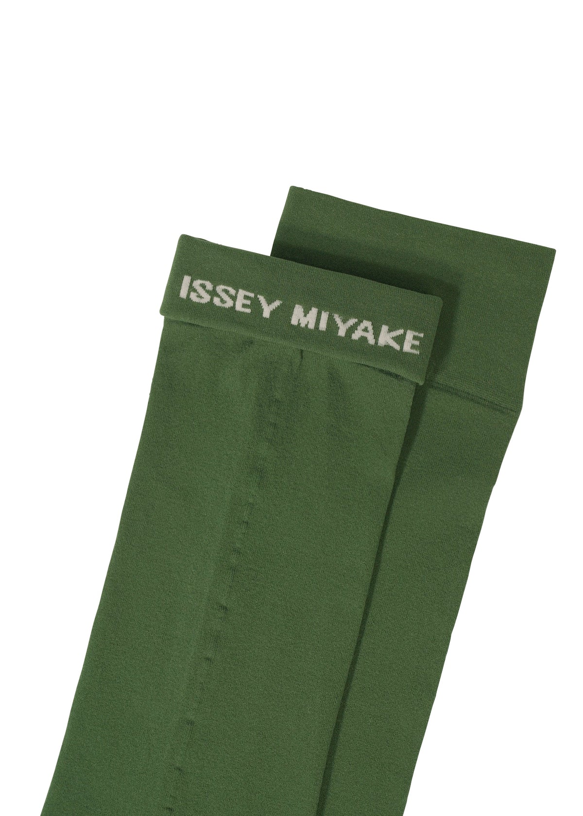 A pair of green SHEER SOCKS by ISSEY MIYAKE, featuring the brand's white logo on the top cuffs, laid flat against a white background. view 7 of 8