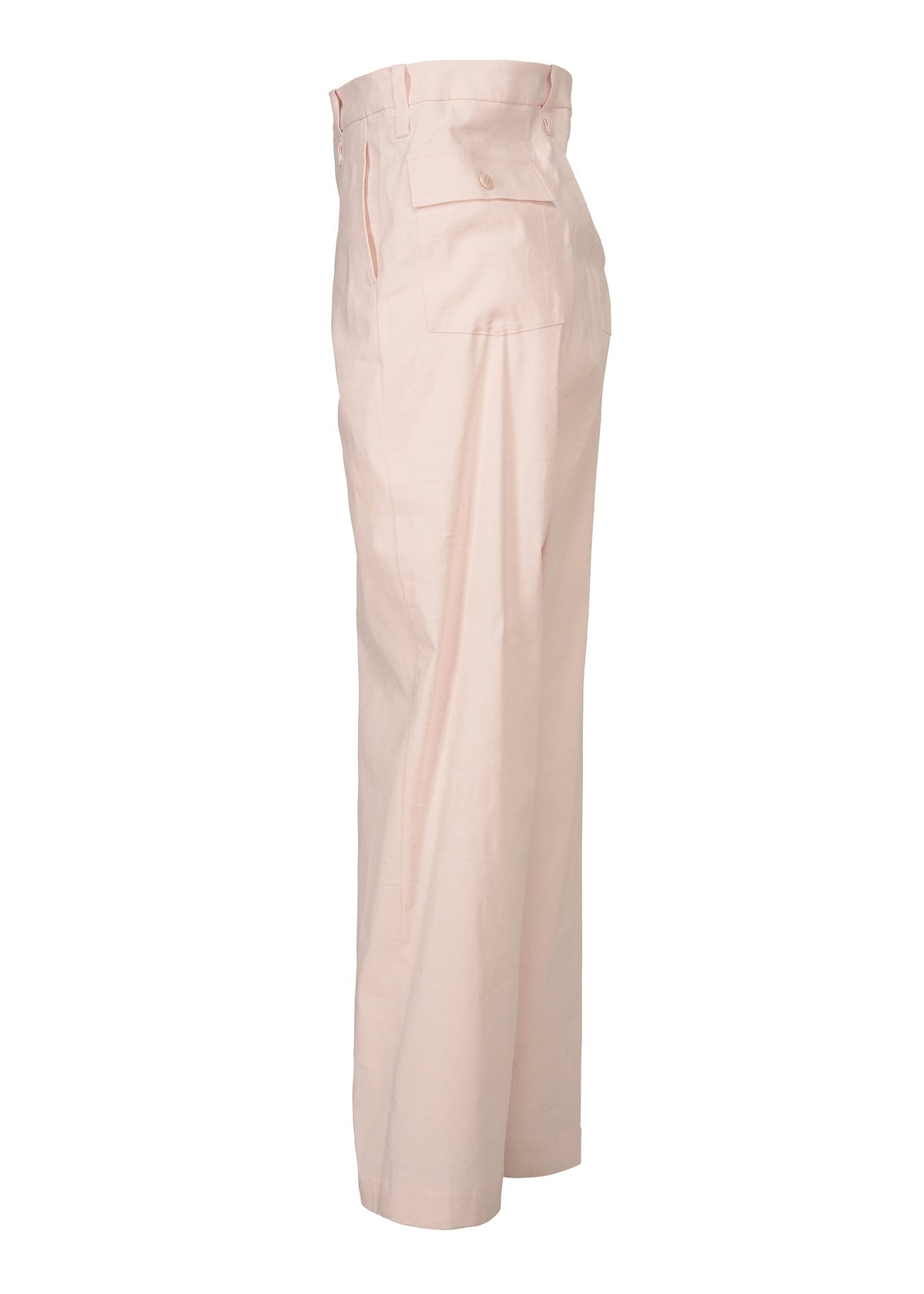 The GENERIC WEAR pants by ISSEY MIYAKE are light pink, high-waisted, and straight-legged, shown from the side with a button flap back pocket, belt loops, and tailored seams for a playful yet polished look. view 3 of 7