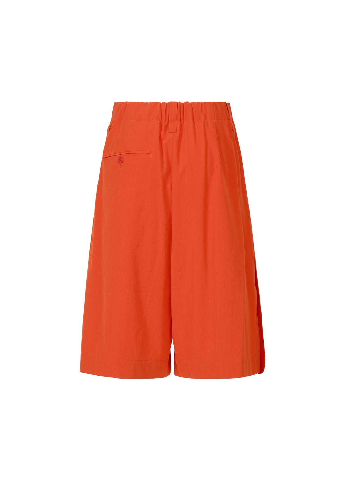 The LOOPED shorts by ISSEY MIYAKE are bright orange, knee-length, and made from stretch fabric with a playful design, elastic waistband, and a single back pocket. Shown on a plain white background. view 3 of 8