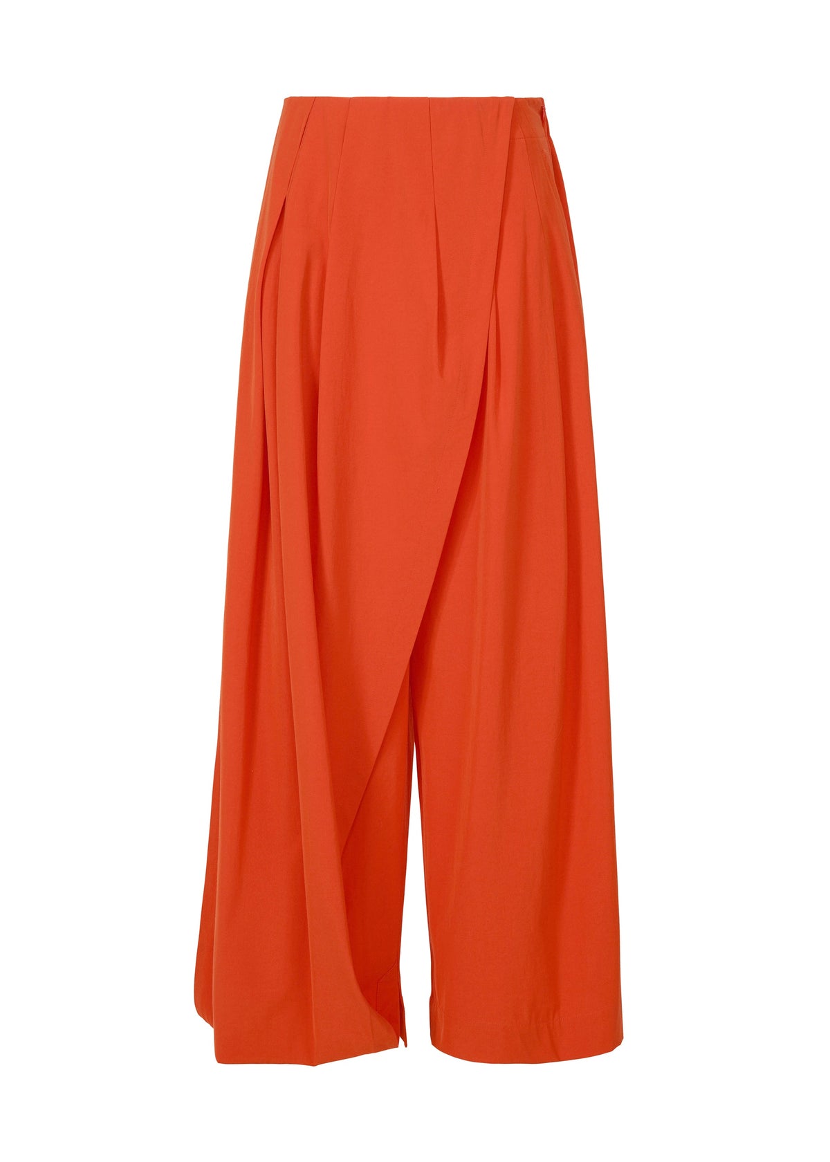 The LOOPED culotte pants by ISSEY MIYAKE feature a bright orange hue, high waist, distinctive belt loops, and overlapping draped front panels, shown against a plain white background. view 2 of 9