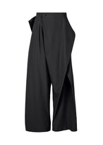 The FLUTTERING PANTS by ISSEY MIYAKE are high-waisted, wide-leg black double-woven pants featuring an asymmetrical front wrap, side pocket, cropped length, and matte finish. Shown on a plain white background. - BLACK （no.15）