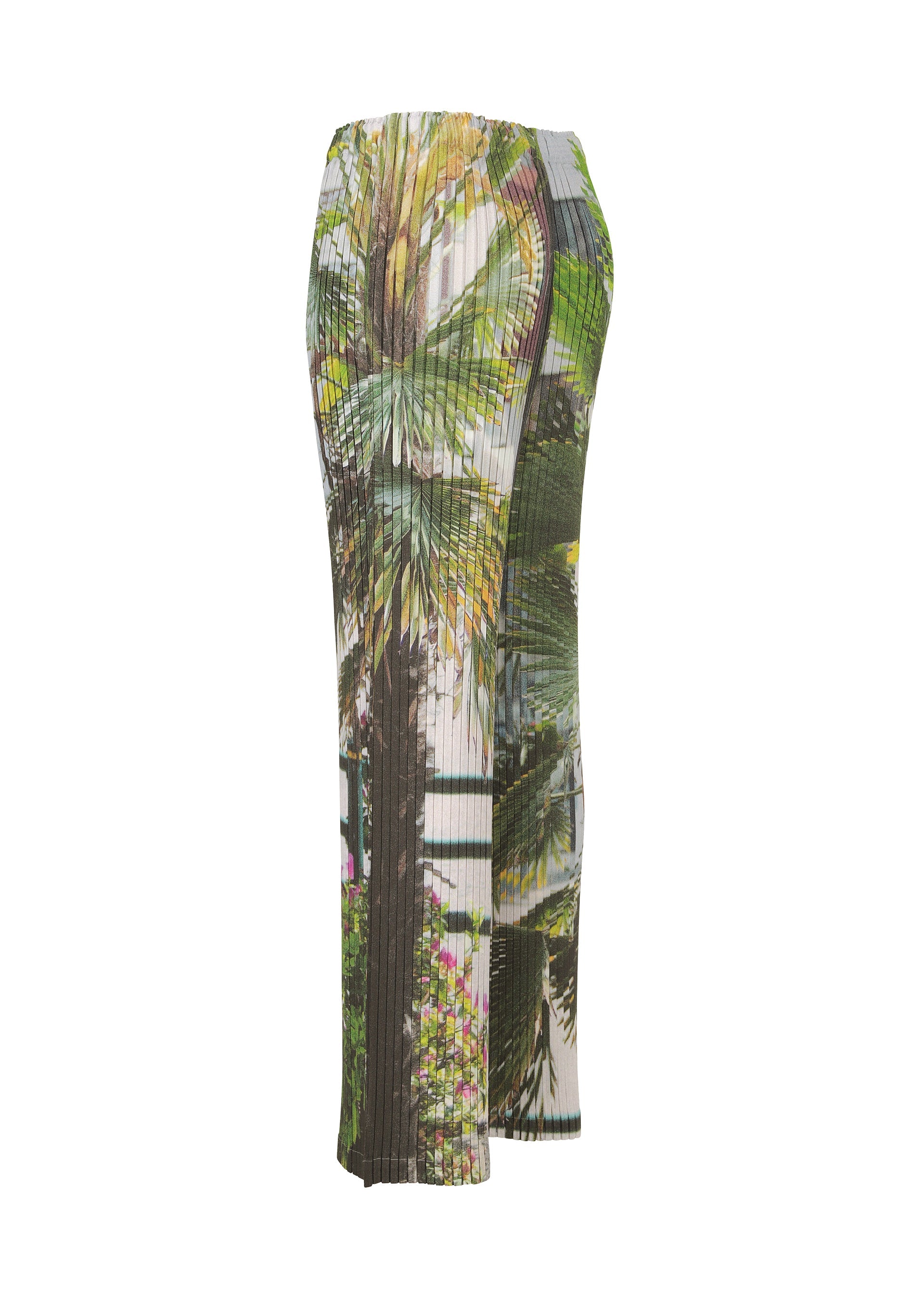 Zoomed view The ISSEY MIYAKE URBAN JUNGLE PLEATS is a pleated, ankle-length skirt with a fitted waist and straight silhouette, featuring a vibrant city-inspired palm tree and foliage print in green, yellow, and brown.