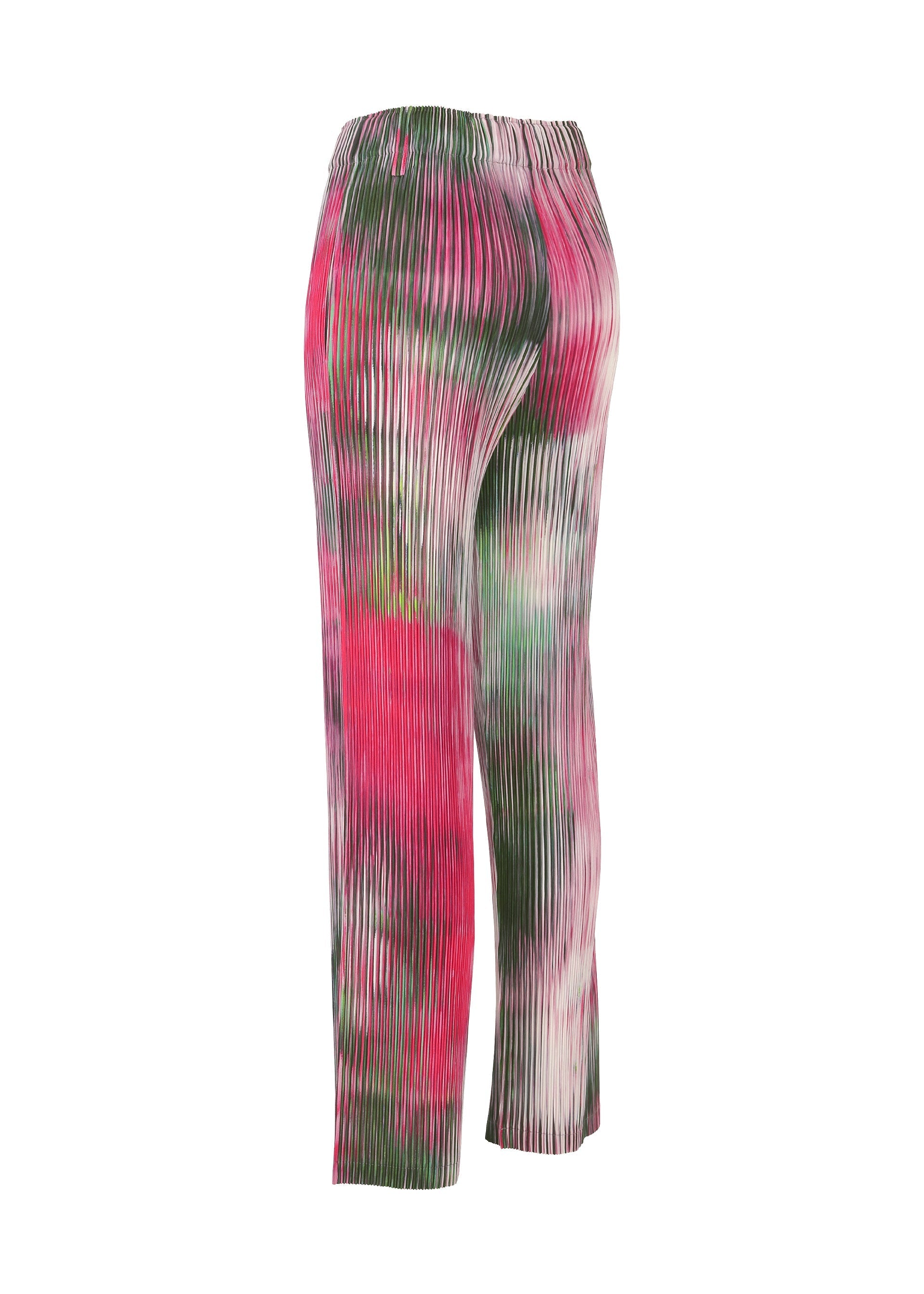 Zoomed view The OBSCURE PLEATS by ISSEY MIYAKE are high-waisted, pleated polyester pants featuring an abstract tie-dye pattern in pink, green, white, and red, shown on a white background.