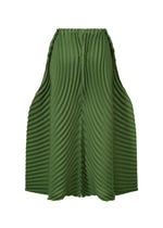 The ISSEY MIYAKE CIRCLE PLEATS PB is a green skirt crafted from plant-derived polyester, featuring an elastic waistband and bold handmade diagonal pleats for a voluminous, wavy, sculptural silhouette.