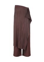The ISSEY MIYAKE PLEATED ON PLEATS shorts are brown, knee-length, with a pleated base and an asymmetrical, layered design featuring overlapping fabric on one side. - BURGUNDY (no.85)