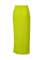 The ISSEY MIYAKE BOX SHOULDER PLEATS skirt in bright yellow-green features double pleating, a high waist, and an asymmetric textured pattern, shown on a plain white background.