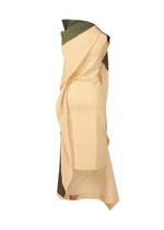 The BODY AT PLAY dress by ISSEY MIYAKE is a sleeveless piece in light beige and olive green stretch fabric with an original pattern and draped layers, shown against a plain white background.