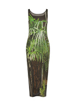 The URBAN JUNGLE PLEATS by ISSEY MIYAKE is a sleeveless, form-fitting midi dress with a vibrant green jungle print of palm leaves and tropical plants set against a dark background. - BLACK-HUED （no.17）