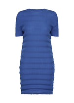 The ISSEY MIYAKE SPRING PLEATS is a short-sleeved, knee-length blue dress featuring a fitted silhouette and handmade textured pleats in high-twist polyester. - STARLING BLUE （no.74）