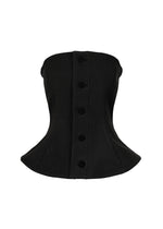 The ISSEY MIYAKE ARMS is a black strapless bustier corset top featuring a structured, curved waist and five large front buttons, shown against a white background. - BLACK (no.15)