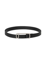 The ISSEY MIYAKE SOLID LEATHER BELT is a slim, minimalist belt made from high-quality leather with a simple rectangular silver buckle, shown against a plain white background. - BLACK （no.15）