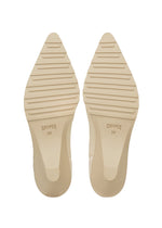 Two beige pointed shoe soles with horizontal grooves and the brand ISSEY MIYAKE 38 stamped on each sole, shown against a white background—these soles are designed for the ANNA range, renowned for its innovative knitted footwear and sock-like shoes.