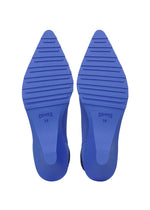 Pair of blue pointed shoe soles with horizontal grooves, ISSEY MIYAKE 38 printed on each sole, viewed from the bottom against a white background—designed for the ANNA shoes by ISSEY MIYAKE, these soles enhance both comfort and the modern appeal of this knitted footwear.
