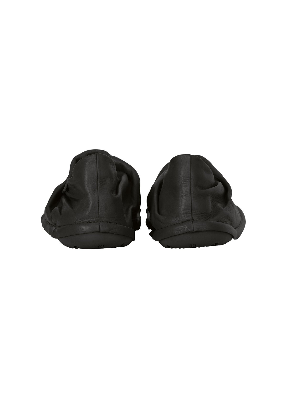 A pair of black PEU FORM slip-on shoes from ISSEY MIYAKE, featuring a wrinkled design and shown from the back against a white background. view 4 of 8