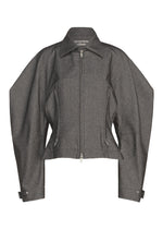 A gray structured jacket by ISSEY MIYAKE, named REFLECTION, featuring wide angular sleeves, a front zipper, two zippered pockets, a pointed collar, and cuffed wrists. Its sleek finish and modern edge give it the look of a silver jacket. The label inside reads ISSEY MIYAKE. - GRAY （no.12）