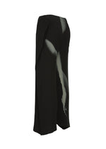 The HANDS OF LOVER PLEATS skirt by ISSEY MIYAKE is a black, mid-length pleated skirt featuring an original white inkjet-printed pattern on the front. Crafted from polyester crepe de chine, it showcases a flowy, asymmetric silhouette and is displayed against a white background.