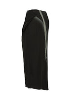 The HANDS OF LOVER PLEATS skirt by ISSEY MIYAKE is a black, knee-length pleated polyester crepe de chine design featuring a subtle sheen and an asymmetrical draped silhouette, displayed against a white background.