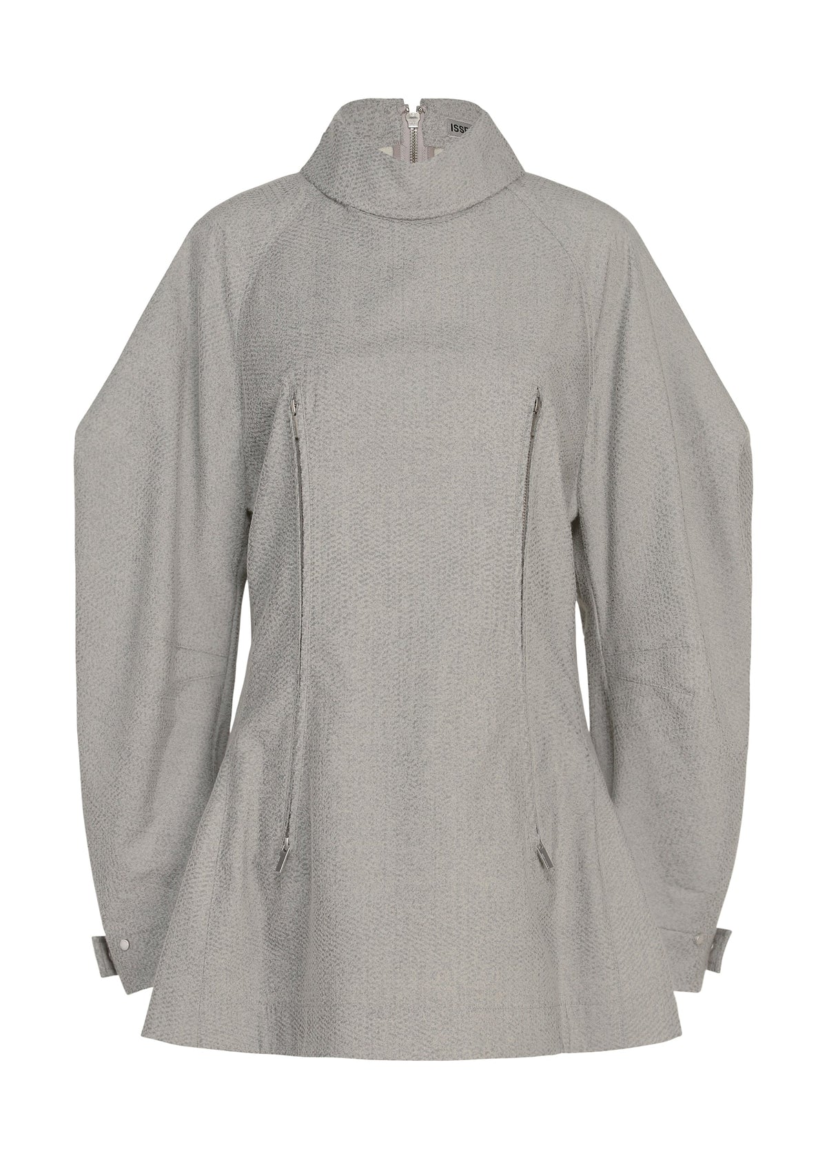 REFLECTION by ISSEY MIYAKE is a silver, long-sleeved high-neck tunic crafted from textured reflector fabric. It features two front vertical zippers, a flared hem, and adjustable tabs at the sleeve cuffs for a contemporary touch. view 1 of 8