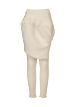 FOUND STONE by ISSEY MIYAKE is a cream-colored, ribbed knit piece combining a high-waisted skirt with attached leggings, featuring an asymmetrical drape and stone-inspired textures. - OFF-WHITE （no.02）