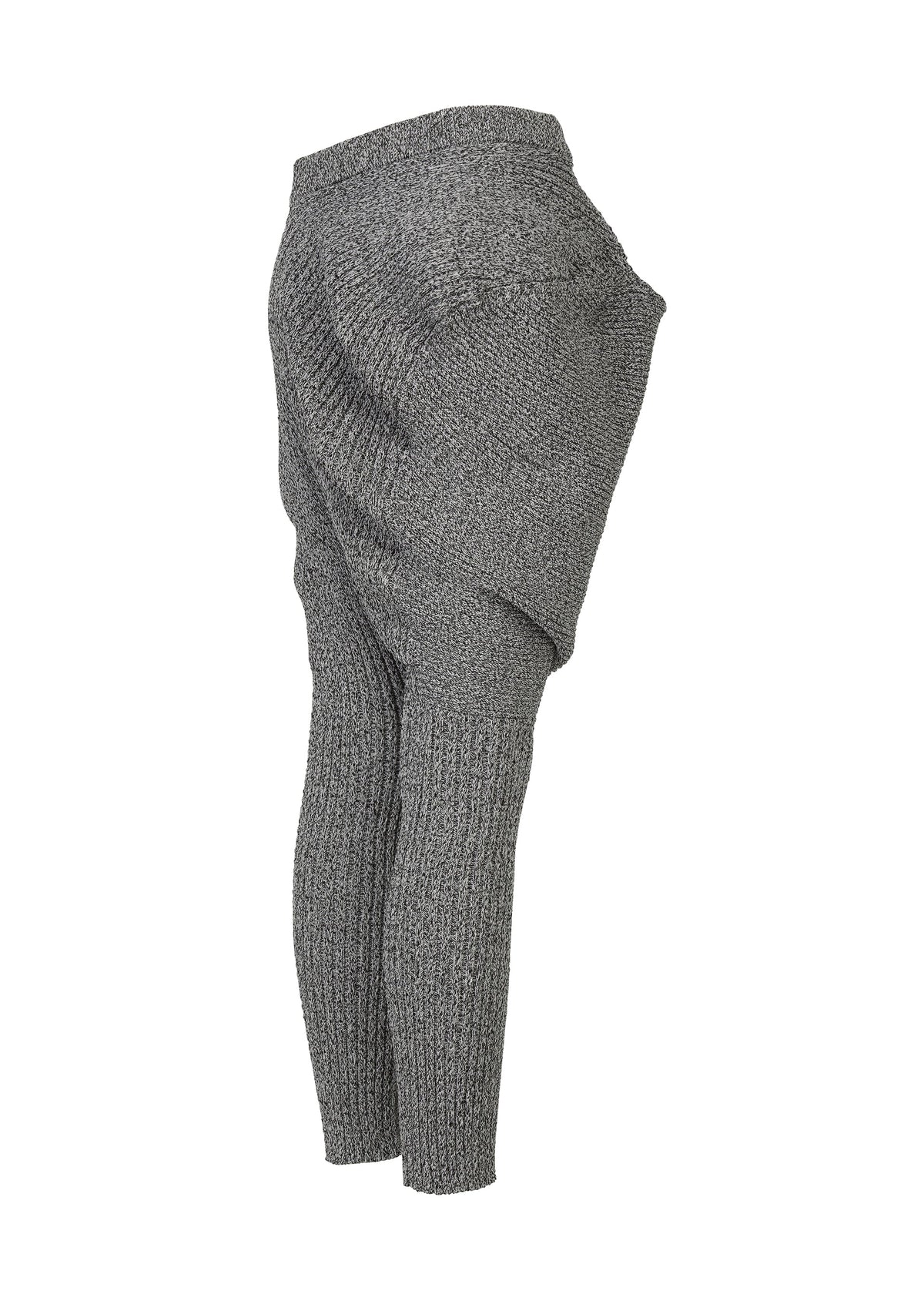 FOUND STONE sarouel pants by ISSEY MIYAKE, featuring a stone-inspired knit, exaggerated wide hips, and fitted lower legs. Shown in gray on a white background. view 5 of 8